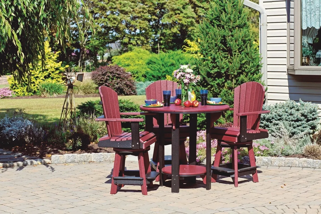 A table and chairs set in the middle of an outdoor patio.