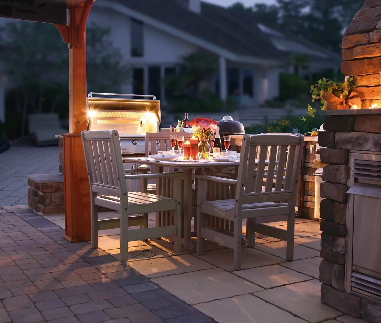 A table and chairs outside in the evening.