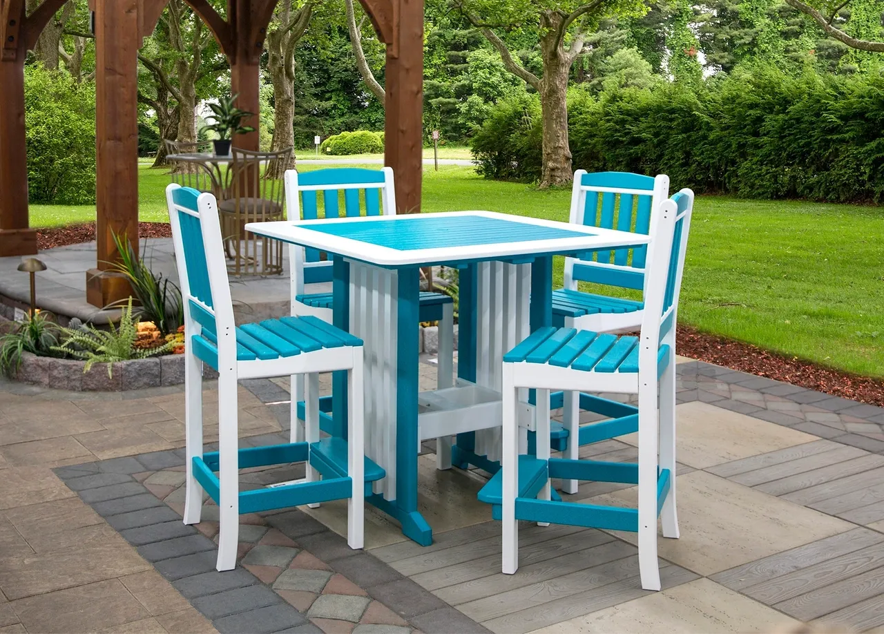 A table and chairs set in the middle of an outdoor patio.