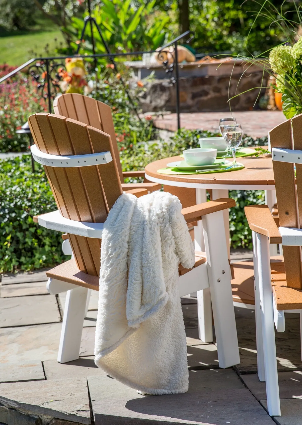 A table and chairs set up outside on the patio.