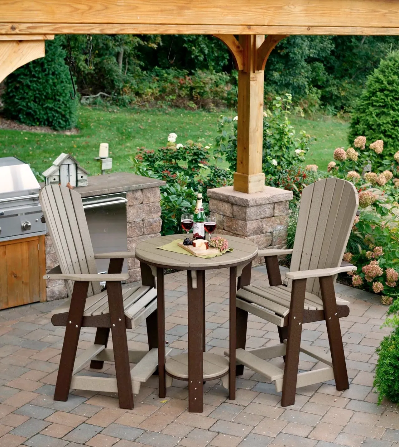 A table and two chairs in the middle of an outdoor patio.