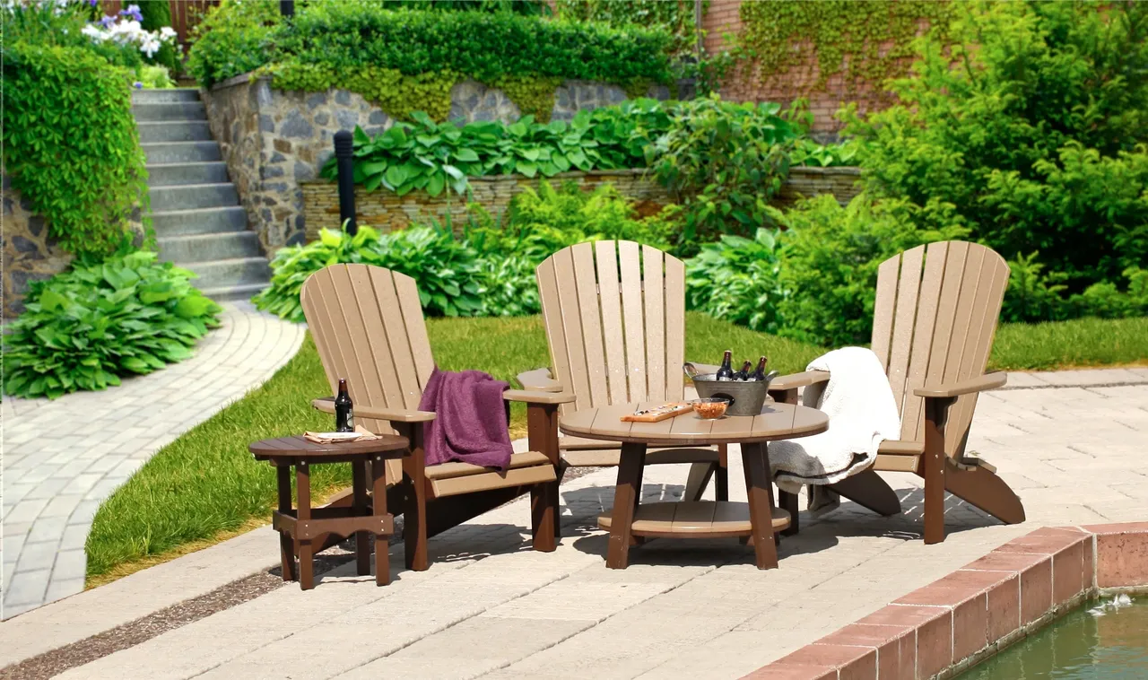 A group of chairs and tables on the patio.