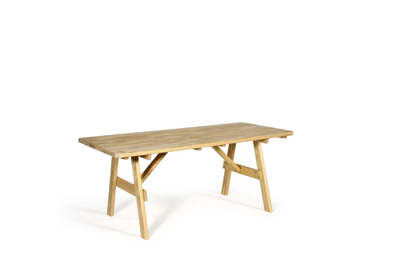 A wooden table with no one around it.