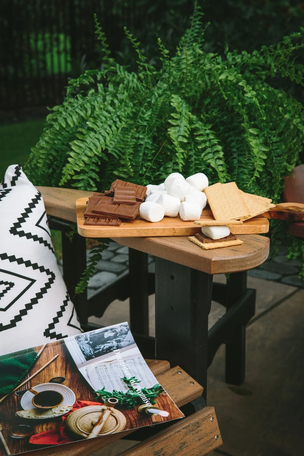 A table with s 'm ores and crackers on it.